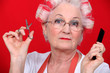 Foto: grandmother with scissors and haircurlers grandmother with scissors and haircurlers