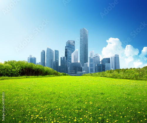 Photo: spring park and modern city spring park and modern city