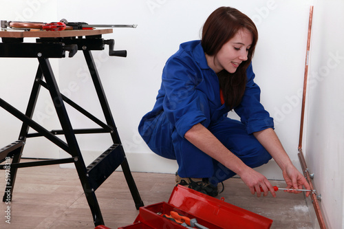 Photo: Young trainee plumber Young trainee plumber