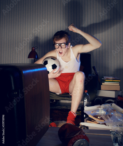 Photo: Soccer Fan Watching Television Soccer Fan Watching Television