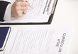 Photo: Filling the form at job interview Filling the form at job interview