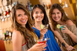 Gorup of girls having drinks