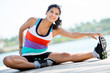Woman stretching outdoors