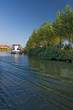 Pleasure boat anchored on a calm river