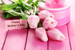 Beautiful bouquet of tulips and gift for Mother's Day