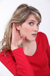 Woman straining to hear