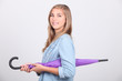 Foto: portrait of a young woman with umbrella portrait of a young woman with umbrella