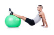 Man With Swiss Ball Doing Exer...