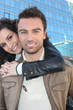 Couple in front of a building
