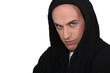 Photo: Man in a hooded jumper Man in a hooded jumper