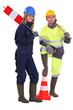 Photo: A couple of road workers. A couple of road workers.
