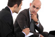 Photo: Businessmen interacting Businessmen interacting