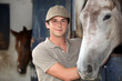 Foto: Teen in equestrian center Teen in equestrian center