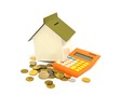 House, calculator and coins, buying property concept