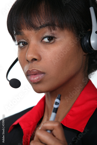 Photo: Call-centre operative holding pen Call-centre operative holding pen