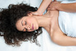 woman having chiropractick neck adjustment