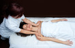 woman having chiropractick neck adjustment