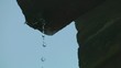 Water Dripping from a Gutter