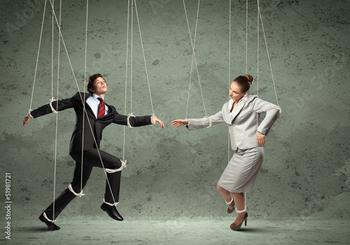 Photo: Puppet businesspeople Puppet businesspeople