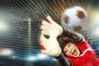 Goalkeeper catches the ball