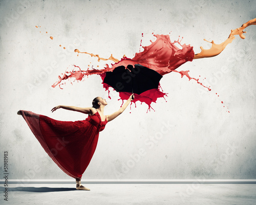 Photo: Ballet dancer in flying satin dress with umbrella Ballet dancer in flying satin dress with umbrella