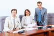 Three businesspeople at meeting