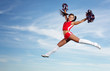 Young female cheerleader
