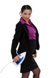Photo: Businesswoman stood with iron Businesswoman stood with iron