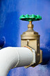 Green valve and blue tank.