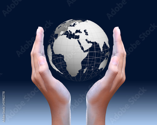 Photo: two hands holding global two hands holding global
