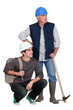 Photo: A handyman and his trainee. A handyman and his trainee.
