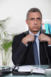 Businessman with two phones