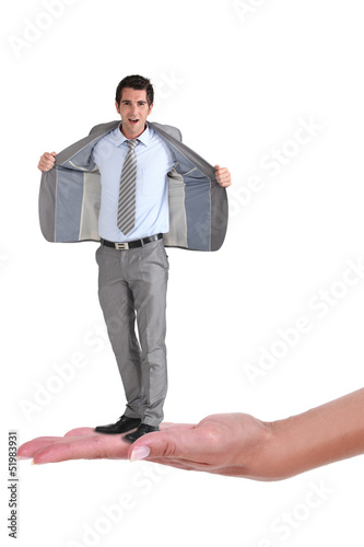 Photo: Businessman with an open jacket on a woman's hand Businessman with an open jacket on a woman's hand