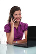 Foto: Secretary talking on the phone Secretary talking on the phone