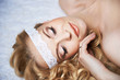 Beautiful girl lies on bed