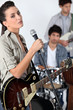 Female singer in a band