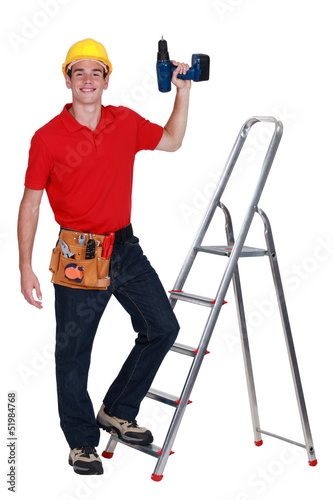 Photo: Construction worker with a drill Construction worker with a drill