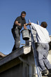 Workers on a roof