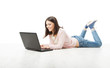 Foto: Girl teenager using laptop. Woman Typing in computer Girl teenager using laptop. Woman Typing in computer