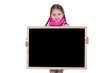 Little girl stands with a whiteboard in her hands