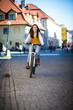 Urban biking - teenage girl and bike in city