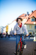 Urban biking - teenage boy and bike in city