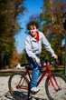 Urban biking - teenage boy and bike in city park