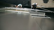 Workers Washing the Facade of a Modern Office Building