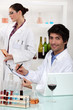 Scientists conducting experiments