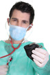 surgeon auscultating a purse