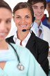 Photo: Telephone operators sat in a row Telephone operators sat in a row