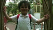 Portrait of a happy little boy at the park