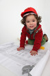 Young child pretending to be a construction worker