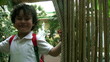 Portrait of a happy little boy at the park